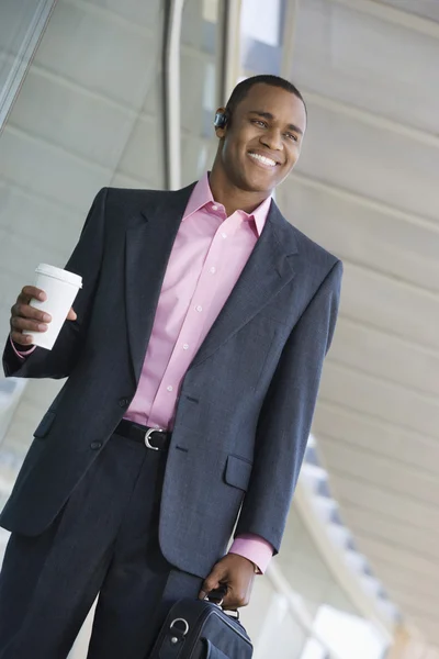 Businessman Holding Takeout Coffee And Briefcase — Stock Photo, Image