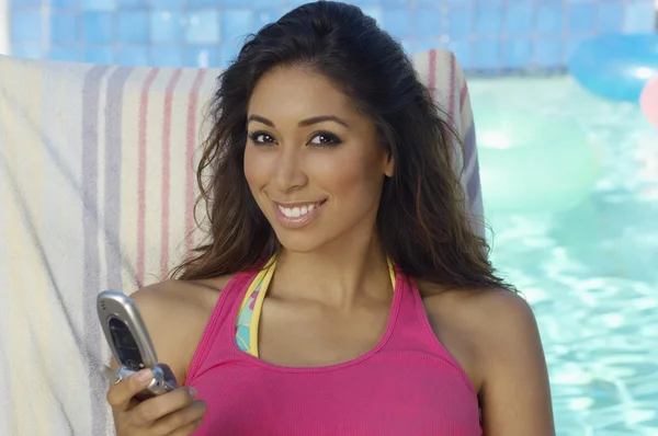 Beautiful Woman in Tank Top Holding Cell Phone — Stock Photo, Image