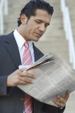işadamı okuma gazete
