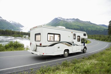 USA, Alaska, Recreational Vehicle Driving On Road