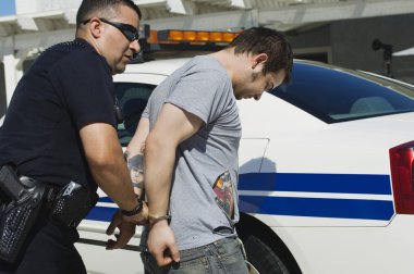 Officer Arresting Drug Dealer clipart