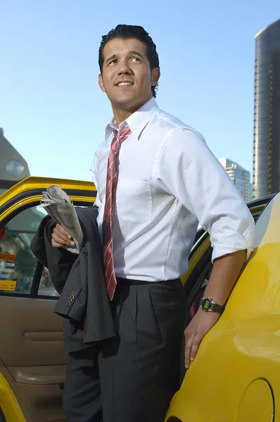 Businessman Getting Out Of Taxi — Stock Photo, Image