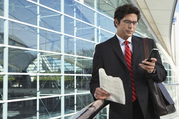 Businessman Using Mobile Phone Outside Office — Stock Photo, Image