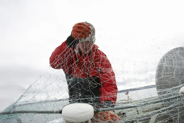 Pescador con red de pesca — Foto de Stock