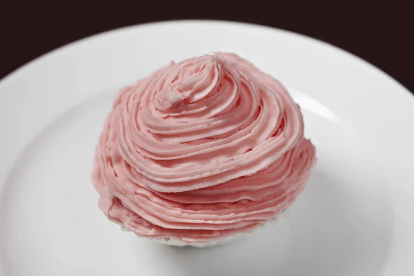 Rosa Cupcake auf Teller — Stockfoto