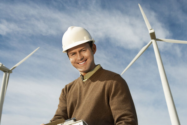 Happy Engineer At Wind Farm