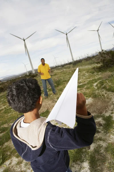 Father And Son Playing At Wind Farm — Stock Photo, Image