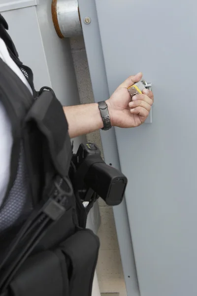 Security Guard Checking Padlock — Stock Photo, Image