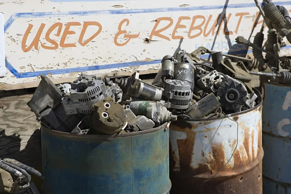 Sign And Rusty Barrels In Junkyard — Stock Photo, Image