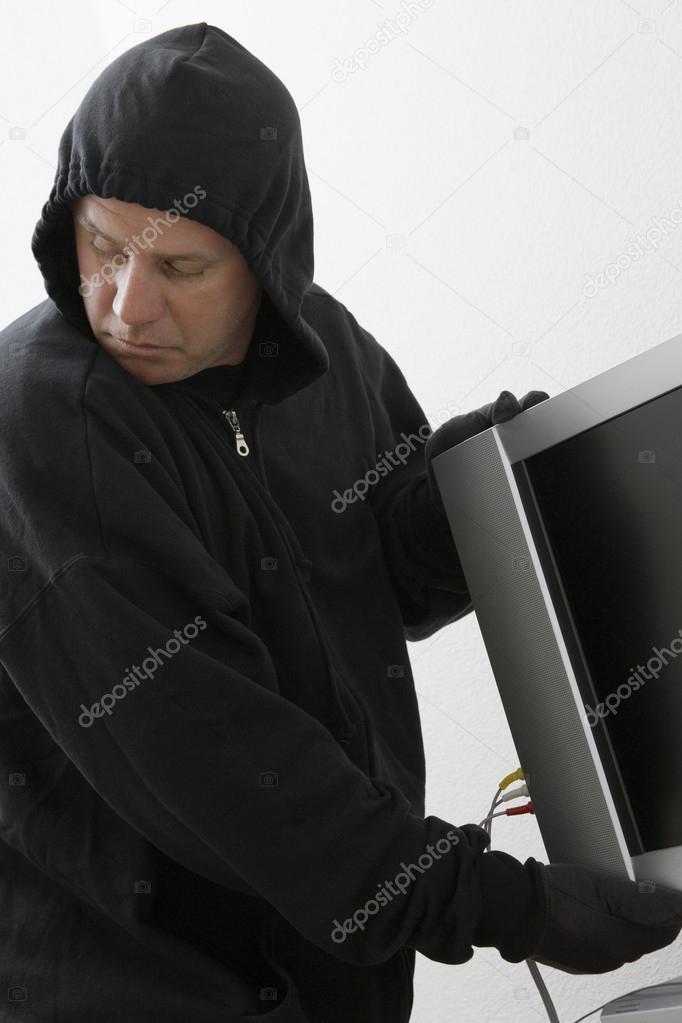 Burglar Stealing Television Set