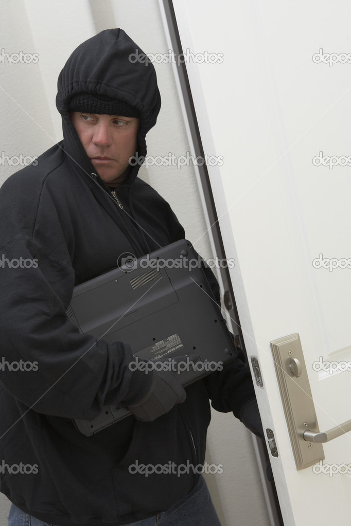 Burglar Stealing Laptop
