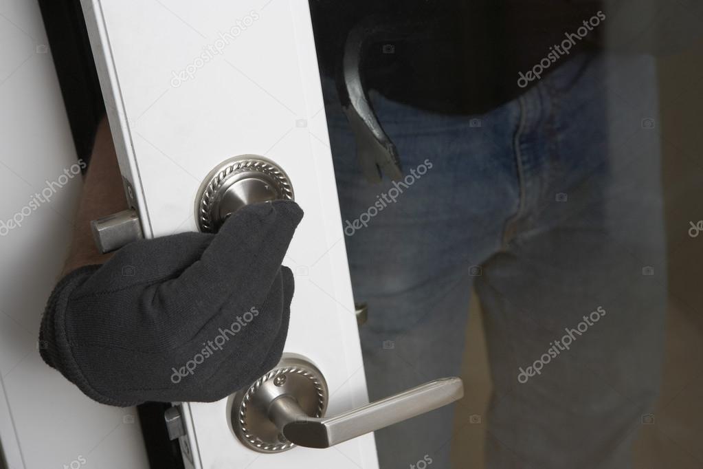 Burglar Breaking Into House