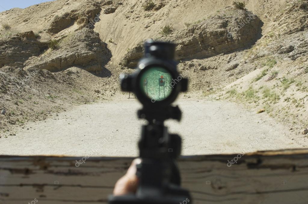 looking through a rifle scope