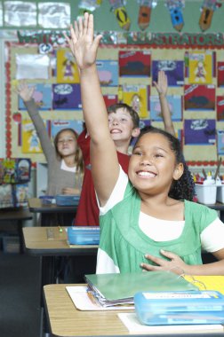 Students Raising Hands To Answer clipart