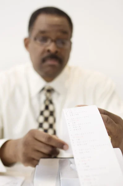 Accountant Reading An Adding Machine Tape — Stock Photo, Image