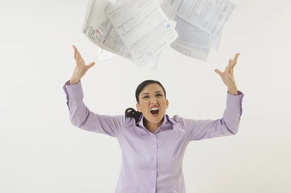 Woman Tossing Forms In The Air — Stock Photo, Image