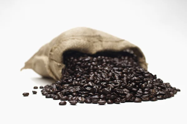 Coffee Beans Scattering Out Of Sack — Stock Photo, Image