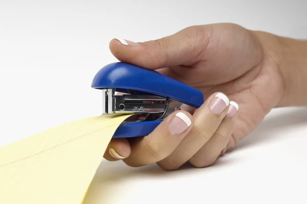 Closeup Of Woman's Hand Stapling Document — Stock Photo, Image