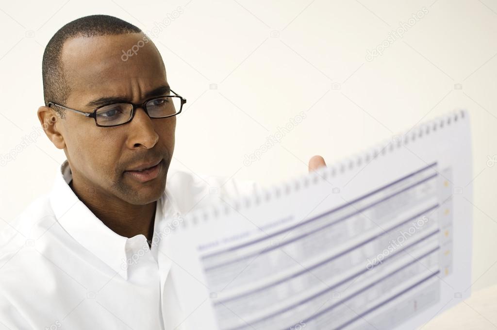 Man Reading A Document