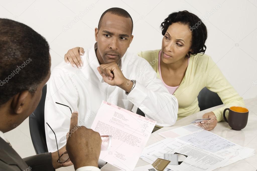 Couple Talking With Accountant