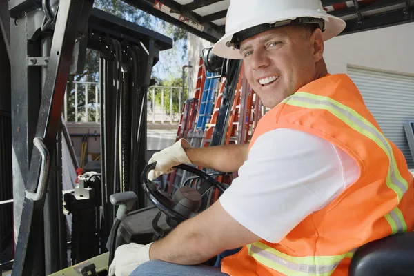 Autista del carrello elevatore — Foto Stock