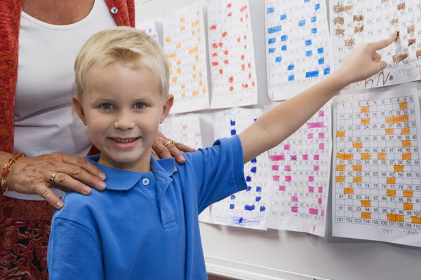 Leraar tonen klasse een klok — Stockfoto