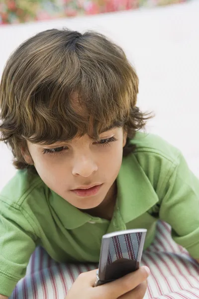 Young Boy Using Cell Phone — Stock Photo, Image