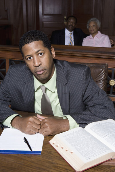 Solicitor Sitting In Courtroom