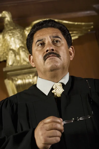 Pensive Judge Holding Glasses — Stock Photo, Image