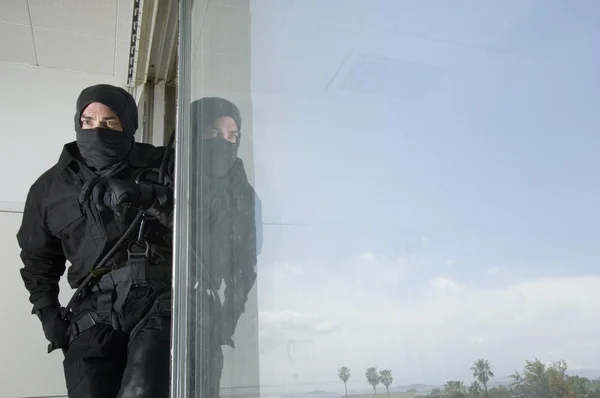 SWAT Team Officer in Window — Stock Photo, Image