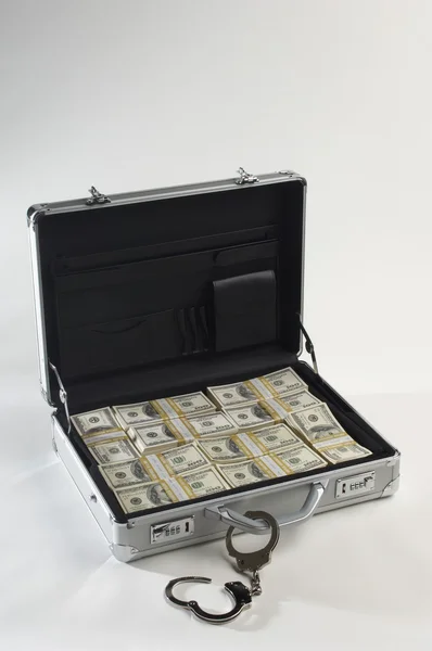 Suitcase And Dollars With Handcuffs — Stock Photo, Image