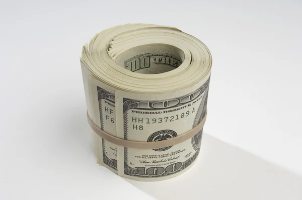 Свернутые деньги — стоковое фото