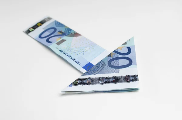 Pijl teken gemaakt van euro factuur — Stockfoto