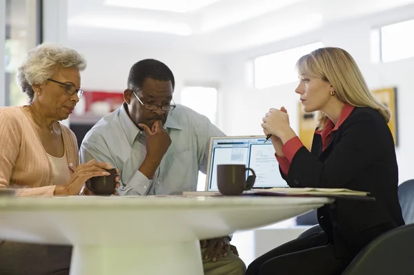 Financial Advisor Assisting Senior Couple — Stock Photo, Image