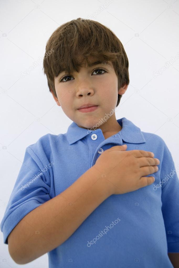 Boy With Hand On Heart