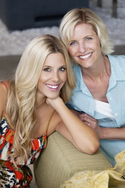 Portrait of beautiful young woman with her mother — Stock Photo, Image