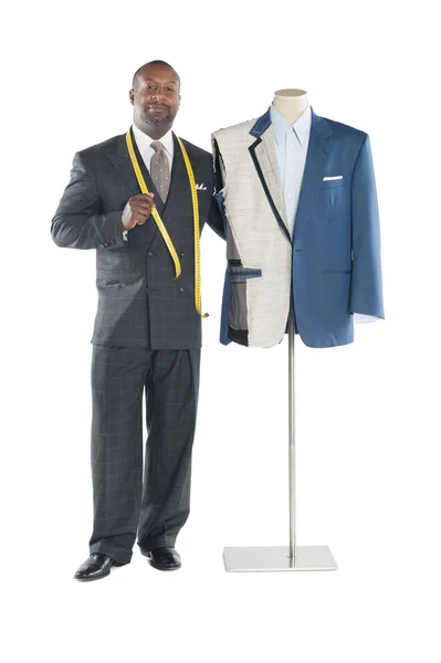 Portrait of tailor standing with mannequin — Stock Photo, Image