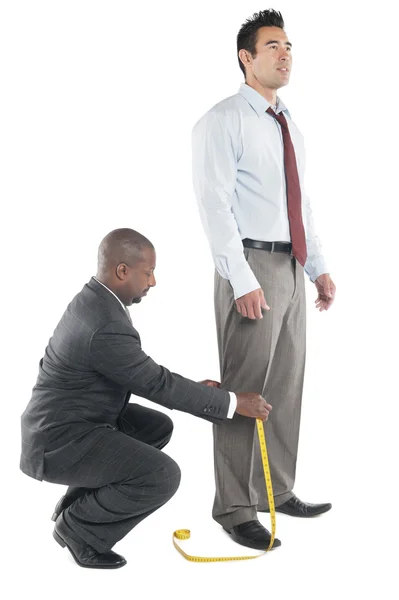 African tailor taking measurements — Stock Photo, Image