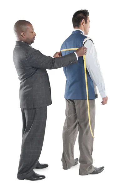 Man having back measured by tailor — Stock Photo, Image