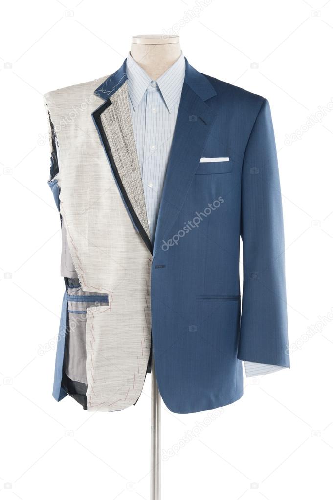 Suit on tailor's dummy over white background