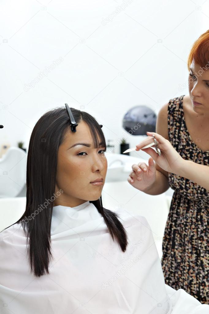 Woman getting new hair style