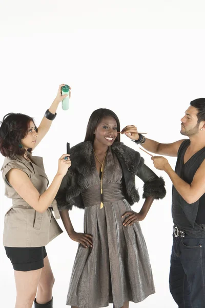 Happy Model Standing With Two Artist's Assisting — Stock Photo, Image