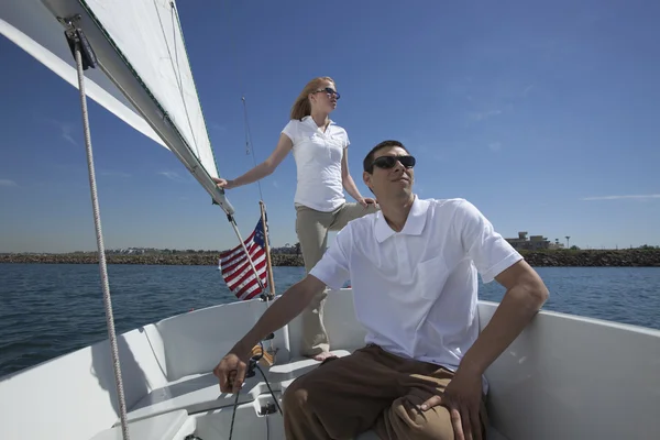 Multiethnic Couple On Sailboat — Stock Photo, Image