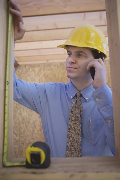 Architect Working While Using Cell Phone At Site — Stock Photo, Image