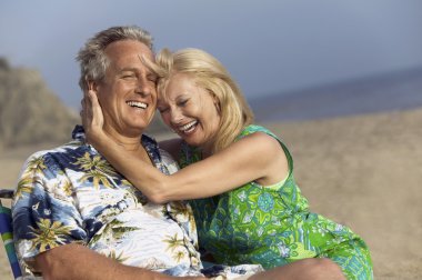 Middle-Aged Couple at Beach clipart