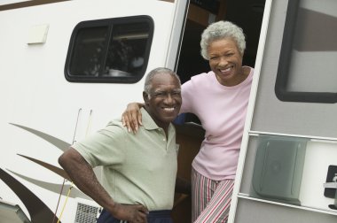 Couple with Their RV clipart