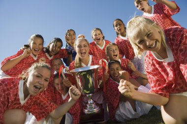 Victorious Soccer Team with Trophy clipart