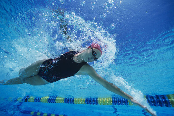 Swimmer racing underwater