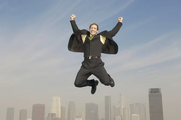 Businessman jumping — Stock Photo, Image