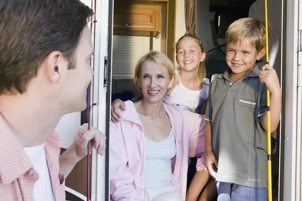 Family in camper van — Stock Photo, Image